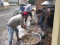 Cleaning and preparing for the chickens to be cooked..jpg